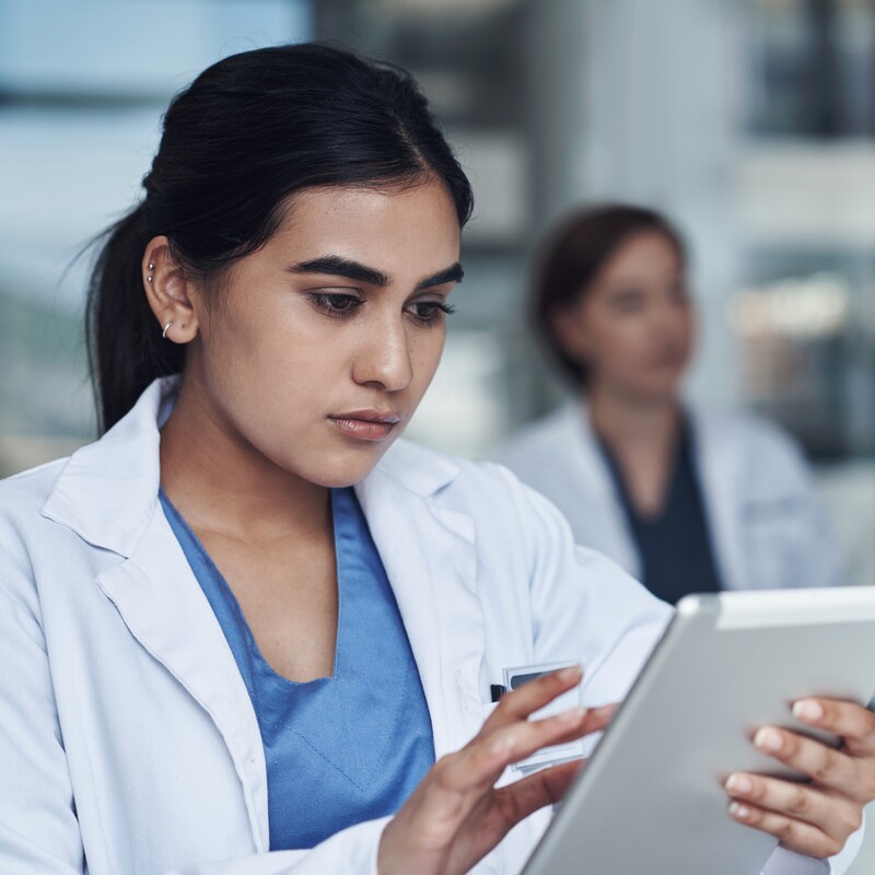 woman checking ipad